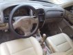 Mazda 626   2005 - Cần bán Mazda 626 đời 2005, màu đen, xe gia đình, giá chỉ 175 triệu