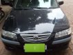 Mazda 626   2005 - Cần bán Mazda 626 đời 2005, màu đen, xe gia đình, giá chỉ 175 triệu