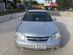 Daewoo Lacetti 2015 - Cần bán gấp Daewoo Lacetti đời 2015, màu bạc chính chủ, giá 215tr