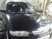 Mazda 323 2000 - Bán ô tô Mazda 323 sản xuất 2000, màu đen