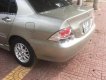 Mitsubishi Lancer 1.6 2004 - Cần bán Mitsubishi Lancer 1.6 năm 2004, màu vàng