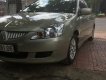 Mitsubishi Lancer 1.6 2004 - Cần bán Mitsubishi Lancer 1.6 năm 2004, màu vàng