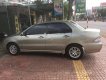 Mitsubishi Lancer 1.6 2004 - Cần bán Mitsubishi Lancer 1.6 năm 2004, màu vàng