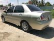 Mitsubishi Galant 1.5 2003 - Bán lại xe Mitsubishi Galant 1.5 2003, màu vàng cát