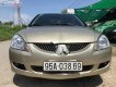 Mitsubishi Galant 1.5 2003 - Bán lại xe Mitsubishi Galant 1.5 2003, màu vàng cát