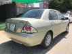 Mitsubishi Galant 1.5 2003 - Bán lại xe Mitsubishi Galant 1.5 2003, màu vàng cát