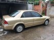 Ford Laser   Deluxe  2001 - Cần bán lại xe Ford Laser Deluxe năm 2001, màu vàng cát