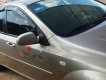 Daewoo Lacetti EX 2011 - Gia đình bán Daewoo Lacetti EX đời 2011, màu vàng