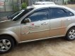 Daewoo Lacetti EX 2011 - Gia đình bán Daewoo Lacetti EX đời 2011, màu vàng