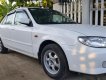 Mazda 323 2004 - Cần bán Mazda 323 classic đăng ký 2004, màu trắng ít sử dụng, 170 triệu
