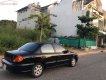 Kia Spectra 1.6 MT 2007 - Cần bán lại xe Kia Spectra 1.6 MT năm 2007, màu đen, 165 triệu