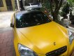 Hyundai Genesis 2.0 Turbo 2010 - Cần bán Hyundai Genesis 2.0 Turbo năm 2010, màu vàng, nhập từ Nhật, 555 triệu