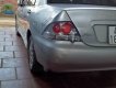 Mitsubishi Lancer 2004 - Cần bán xe cũ Mitsubishi Lancer năm sản xuất 2004, màu bạc xe gia đình