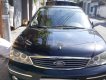 Ford Laser 2004 - Bán xe Ford Laser 1.8 tự động, màu đen