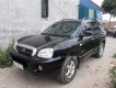 Hyundai Santa Fe 2005 - Cần bán Hyundai Santa Fe 2005, màu đen, xe nhập