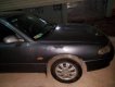 Mazda 626 1995 - Bán Mazda 626 đời 1995, màu đen, giá chỉ 95 triệu