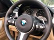 BMW 4 Series  428i  2015 - Cần bán BMW 4 Series 428i Convertible đời 2015, màu trắng, nhập khẩu