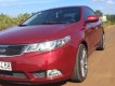 Kia Forte EX 1.6 MT 2011 - Cần bán xe Kia Forte EX 1.6 MT 2011, màu đỏ số sàn, giá chỉ 349 triệu