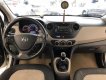 Hyundai Grand i10  1.2 MT 2015 - Cần bán xe Hyundai Grand i10 1.2 MT năm 2015, màu trắng, nhập khẩu, giá tốt