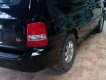 Kia Carnival GS 2.5 MT 2006 - Bán Kia Carnival GS 2.5 MT sản xuất 2006, màu đen, xe gia đình