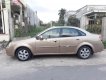 Daewoo Lacetti 2005 - Cần bán lại xe Daewoo Lacetti sản xuất năm 2005, màu vàng, giá tốt