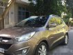 Hyundai Tucson   2010 - Cần bán Hyundai Tucson đời 2010, màu nâu, xe nhập