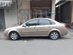 Daewoo Lacetti 2005 - Cần bán lại xe Daewoo Lacetti sản xuất năm 2005, màu vàng, giá tốt