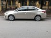 Toyota Vios E 2014 - Bán Toyota Vios E năm 2014, màu ghi vàng, giá chỉ 435 triệu