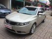 Kia Forte 1.6AT 2011 - Bán xe Kia Forte 1.6AT đời 2011, màu vàng cát