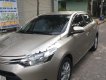 Toyota Vios 1.5E 2017 - Bán Toyota Vios 1.5E năm 2017, màu vàng, xe gia đình