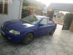 Ford Laser Delu 1.6 MT 2002 - Cần bán lại xe Ford Laser Delu 1.6 MT đời 2002, màu xanh lam chính chủ, giá 145tr