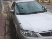 Mazda 323 2004 - Bán ô tô Mazda 323 2004, màu bạc như mới