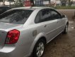 Daewoo Lacetti 2004 - Cần bán xe Daewoo Lacetti năm 2004, màu bạc 