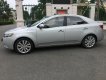 Kia Forte SLI 2009 - Bán Kia Forte SLI 2009, màu bạc