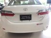 Toyota Corolla altis  1.8E   2018 - Bán ô tô Toyota Corolla altis 1.8E đời 2018, màu trắng, 718tr