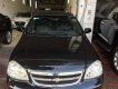 Chevrolet Lacetti 1.6 MT 2014 - Cần bán xe Chevrolet Lacetti 1.6 MT đời 2014, màu đen  