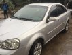 Daewoo Lacetti 2004 - Cần bán xe Daewoo Lacetti năm 2004, màu bạc 