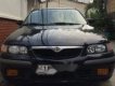 Mazda 626   1997 - Cần bán lại xe Mazda 626 năm sản xuất 1997, màu đen, nhập khẩu số sàn