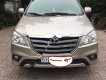 Toyota Innova 2.0E 2014 - Bán xe Toyota Innova 2.0E đời 2014, màu vàng