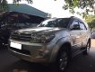 Toyota Fortuner 2010 - Gia đình cần bán Fortuner 2010, số tự động, máy xăng màu bạc