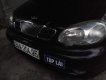 Daewoo Lanos   2005 - Cần bán gấp Daewoo Lanos đời 2005, màu đen