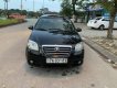 Daewoo Gentra 2009 - Bán Daewoo Gentra đời 2009, màu đen xe gia đình