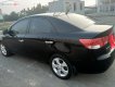 Kia Cerato 1.6 AT 2010 - Bán Kia Cerato 1.6 AT sản xuất 2010, màu đen, nhập khẩu