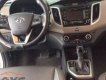 Hyundai Tucson  1.6 AT  2016 - Bán xe Hyundai Tucson 1.6 AT sản xuất 2016, màu trắng số tự động