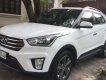 Hyundai Tucson  1.6 AT  2016 - Bán xe Hyundai Tucson 1.6 AT sản xuất 2016, màu trắng số tự động