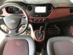 Hyundai Grand i10 1.2AT   2018 - Bán Hyundai Grand i10 sedan 1.2AT màu trắng, số tự động, sản xuất 2018, bản gia đình lăn bánh 11000km