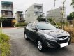 Hyundai Tucson 2010 - Gia đình cần bán xe Tucson 2010 đăng ký 2012, số tự động máy dầu, màu xám