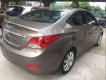 Hyundai Accent   2014 - Bán lại xe Hyundai Accent sản xuất năm 2014, màu nâu, nhập khẩu