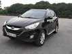 Hyundai Tucson 2.0 AT.  2011 - Cần bán lại xe Hyundai Tucson 2.0 AT. Sản xuất năm 2011, màu đen, xe nhập