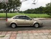 Daewoo Lacetti EX 2009 - Bán xe Daewoo Lacetti EX năm 2009, màu vàng chính chủ